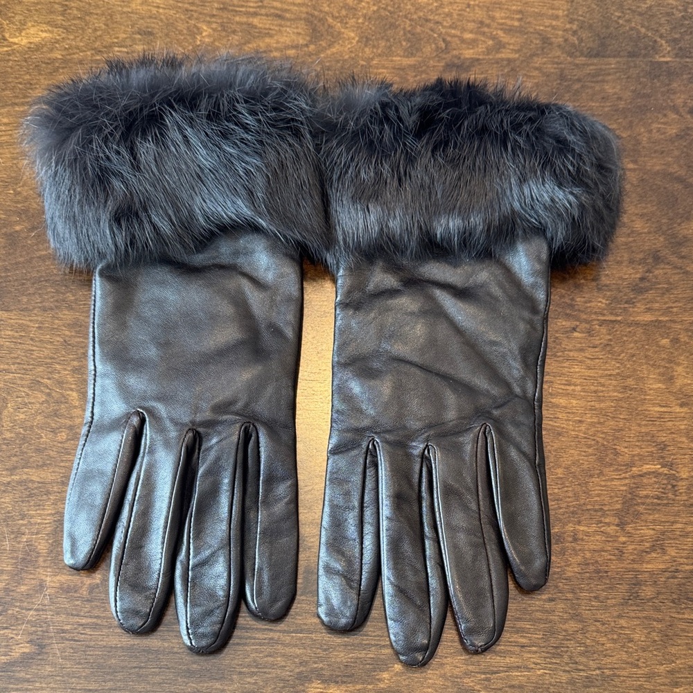 Elegant Black Leather Gloves with real fur trim.